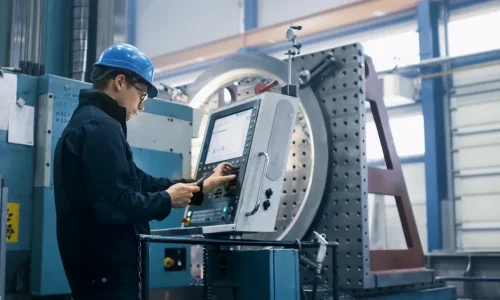 Factory,Worker,Is,Programming,A,Cnc,Milling,Machine,With,A