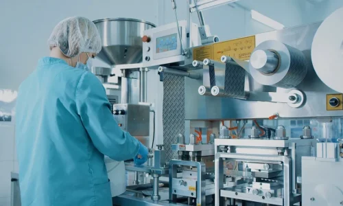 4k,Blister,Packing,Machine.,Woman,Works,At,The,Workplace.,Tablet